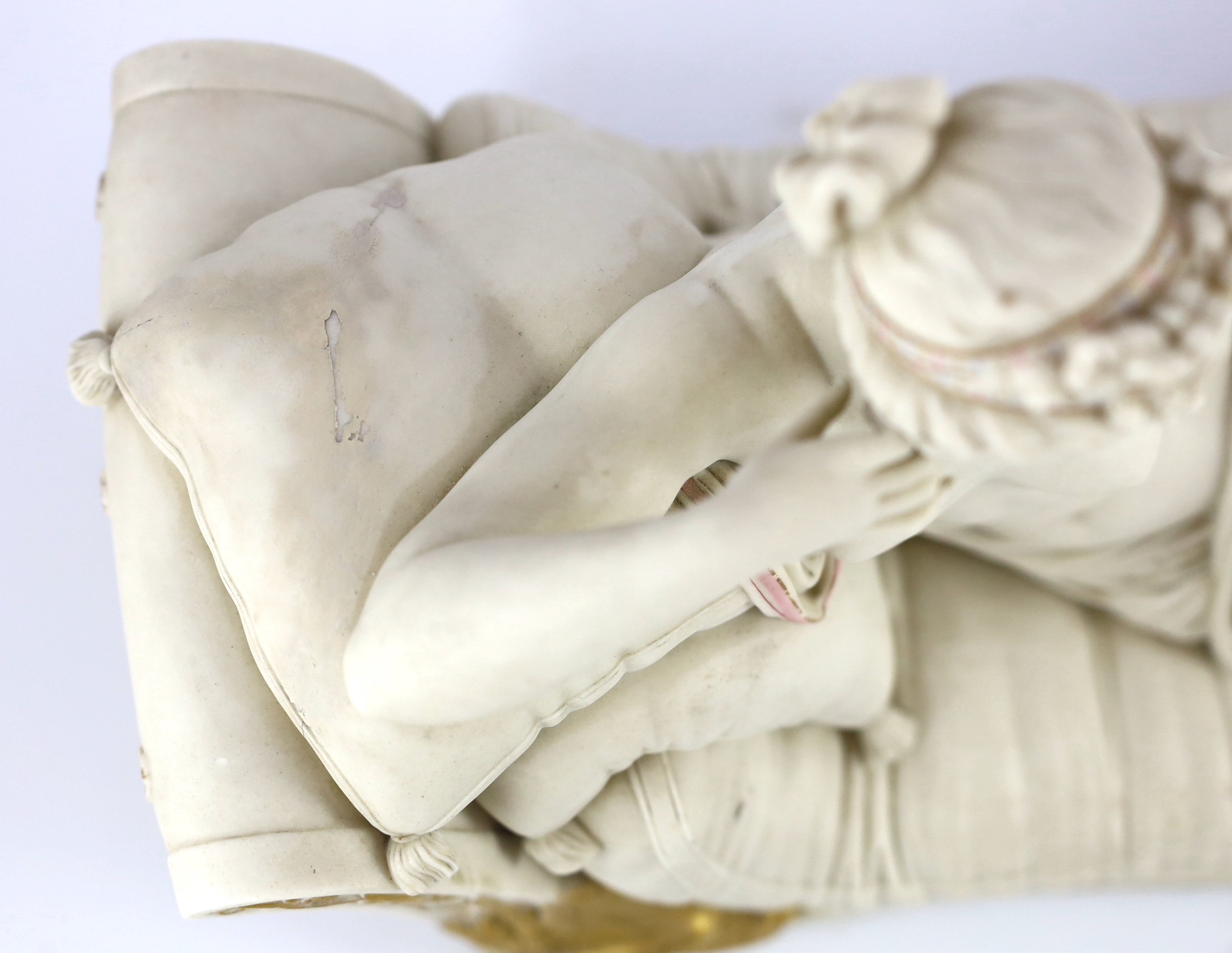 A Royal Worcester parian figure, after Antonio Canova, of Pauline Borghese as Venus Victorious, modelled by James Hadley, c.1866, 59.5cm long, some restoration to edge of base